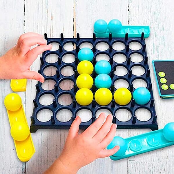 Gra stołowa z podskakującymi piłeczkami slider